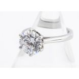 A white metal colourless stone solitaire ring, marked 950 to inner shank, ring size P, 5.7g