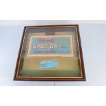 An original, framed Tri-ang Spot-On dealers paper sign, measuring approximately 44x23cm, somewhat