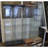 Three open display cabinets, having three glass shelf interiors, 40cm x 36cm x 163cm high (3)