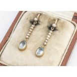 A pair of early 20th Century seed pearl and aquamarine drop earrings, in a fitted P Orr & Sons
