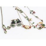 A collection of Les Nereides enamel jewellery, comprising three necklaces and a pair of earrings,