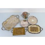 A collection of silver plated trays, including twin handled examples, and a chromed ice bucket and