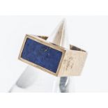 A contemporary gentleman's yellow metal lapis lazuli set signet ring, of rectangular tablet form