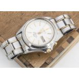 A Seiko Kinetic gentleman's stainless steel wristwatch, white face, day and date window, gilt