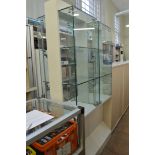 Two display cabinets, having two shelf interior to top section over plinth base, 46cm x 51cm x 181cm