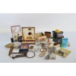 A mixed lot of assorted collectables, including lighters, Mappin & Webb salad servers, silver plated