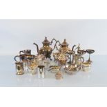 A collection of silver plated ware, including teapots, tankards, trophies, rose bowls and other