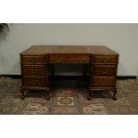 A mid 20th century light mahogany twin pedestal desk, AF, 1565cm wide, 90cm deep and 77cm high