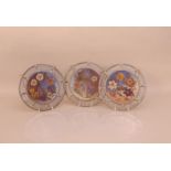 Three mid 20th century circular lead and Glass wall hangings, 25cm diameter, with floral design (3)