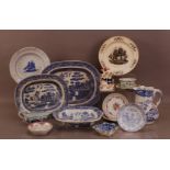 A collection of 19th century ceramics, to include two Willow pattern platters of differing sizes,