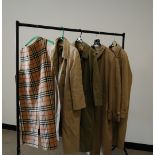 Four Burberry coats, an additional liner and handbag, two men's and two women's coats (6)