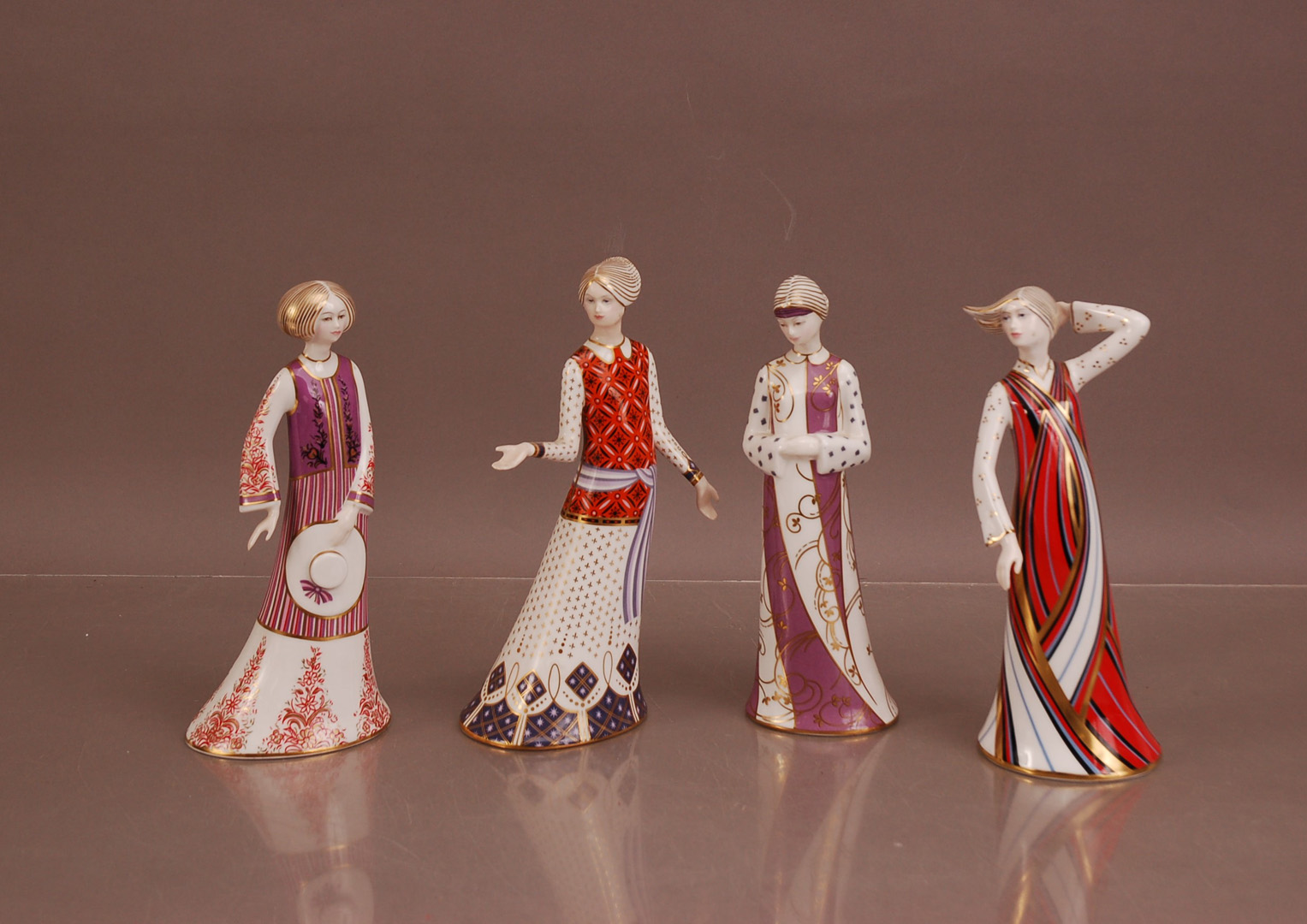 Four Royal Crown Derby Bone China female figures, all from the Classic Collection, comprising,