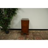 A small late Victorian/Edwardian mahogany narrow chest of draws, four graduated draws with brass