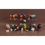 A collection of ceramic Cow Parade cows, comprising London related examples (12)