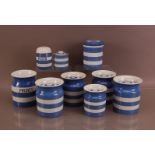 A collection of T.G. Green & Co. Cornish Ware storage jars. familiar blue and white pattern,