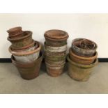 A group of terracotta garden pots, tallest 36cm, varying other sizes, four matching examples, AF,