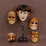 A collection of 20th century masquerade ball masks, of differing styles and sizes (6)