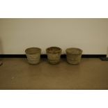 Three concrete garden plant pots, of differing designs, 30cm,35cm and 34cm high, AF (3)