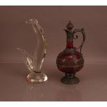 A far eastern cranberry glass wine ewer, Pewter mounted and decorated 34cm, together with a glass