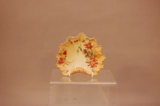An early 20th century Royal Worcester blush ivory pickle dish, 12cm wide, stamped to the underside