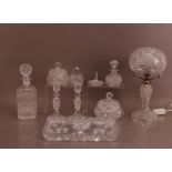 A collection of cut glass items, including a table lamp with cut glass shade 37cm high, a pair of