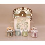 A collection of Aldermaston pottery, comprising, six short lidded jars, a meat platter 36.5cm wide