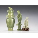 A Chinese Bowenite green Vase and cover, the hardstone carving with mythical beast handles, domed