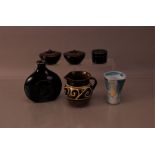 A collection of contemporary pottery, including an earthenware Winchcombe pottery jug by Sidney