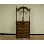 A Georgian and later mixed wood linen press, bracket feet with three long drawers below small