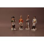 Four 20th century Continental porcelain figures of French 19th and earlier army officers, comprising