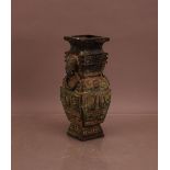 An early 20th century far eastern bronze two handled vase, in Antiquity style, 30cm high