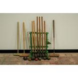 A c1960s garden croquet set, together with two spare mallets and a Slazenger The Corbally mallet,