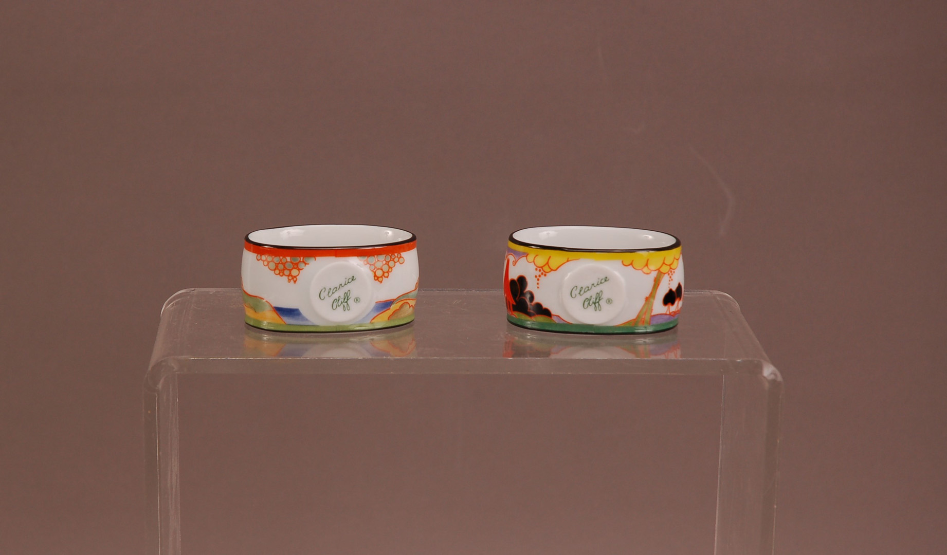 A set of eight Clarice Cliff napkin rings, in a Clarice Cliff retail box with certificate - Image 2 of 2