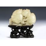 A Chinese Qianlong Jadeite Jade carved panel, of fruit, gourdes and roots, on a pierced hardwood