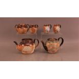 A collection of Royal Doulton stoneware items, comprising a teapot with hunting scene, a milk jug