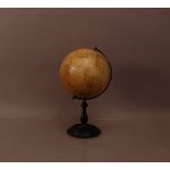 A early 20th century 'Geographia' 8 inch Terrestrial globe, 37cm high, on a turned ebonised wooden