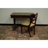 A William IV period rosewood writing table, 106cm by 61cm by 73cm, having green tooled leather top