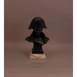 A resin bust of Napoleon Bonaparte, 36cm high, on a marble stepped base, engraved 'Leconnte? 82'
