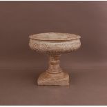 A carved wooden and painted centre-piece, florally carved with a turned column, on a square base,