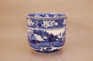 A large early 20th century blue and white Wedgwood cache pot, fallow dear pattern, marked to the
