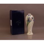 A large Franz porcelain vase, 36cm high with its retail box (2)