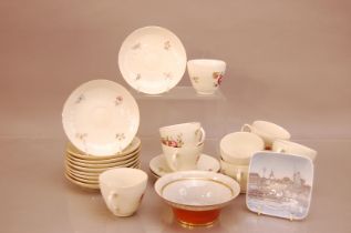 A part set of Royal Copenhagen cups and saucers, 10 cups and 12 saucers, floral pattern with gilt