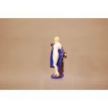 A Royal Doulton porcelain figure of a lady, The Bather', no. HN 687, marked to the base, 20cm high
