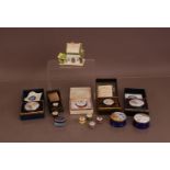A collection of enamel Crumbles trinket boxes, some in their fitted retail boxes, together with a