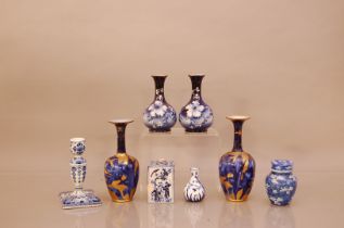 A collection of ceramics, mostly blue and white, including a delft candlestick, 15cm high, two pairs