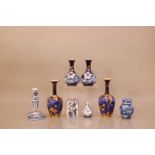 A collection of ceramics, mostly blue and white, including a delft candlestick, 15cm high, two pairs