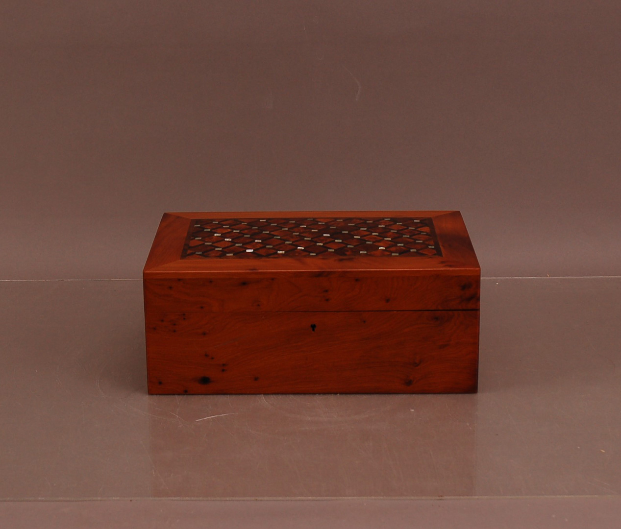 A 20th century Walnut jewellery box, with mother of pearl marquetry lid, fitted interior 11.5cm H