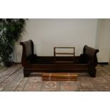A modern mahogany single sleigh bed, together with a vintage pine towel rail, 214cm long 103cm wide,