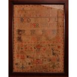 A 19th century sampler, dated 1856, some fading, in a wooden frame with marquetry border 61cm x 47.