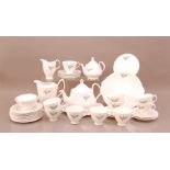 A Royal Albert bone china tea and coffee set, comprising, ten cups and eleven saucers, 12 side
